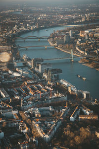 High angle view of river amidst buildings in city