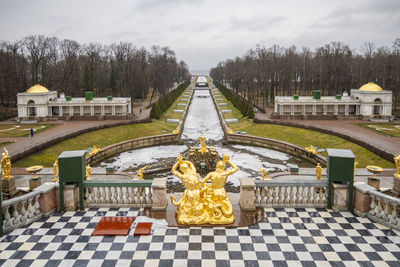 View of parks and fountains of peterhof in winter. central alley of grand cascade fountains 