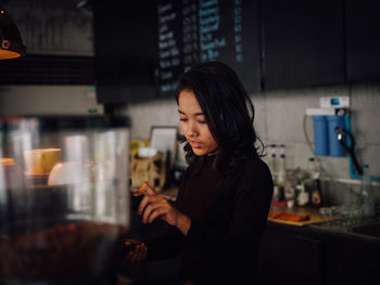 Barista working in cafe