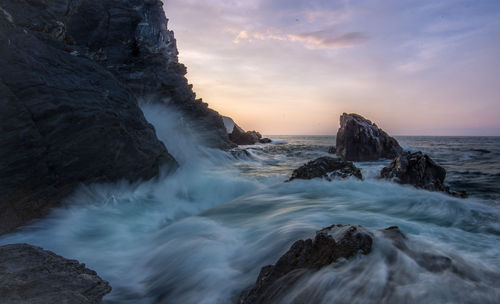 Scenic view of sea against sky during sunset