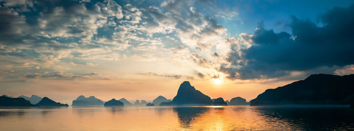 Scenic view of lake against sky during sunset