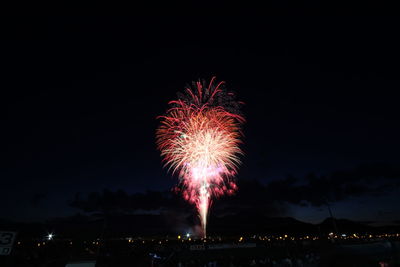 Firework display at night