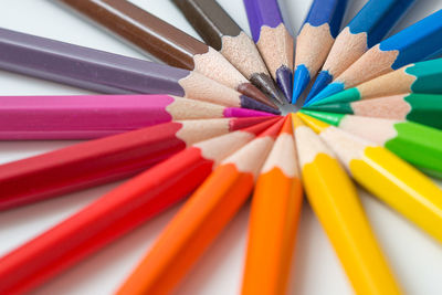 High angle view of multi colored pencils on table