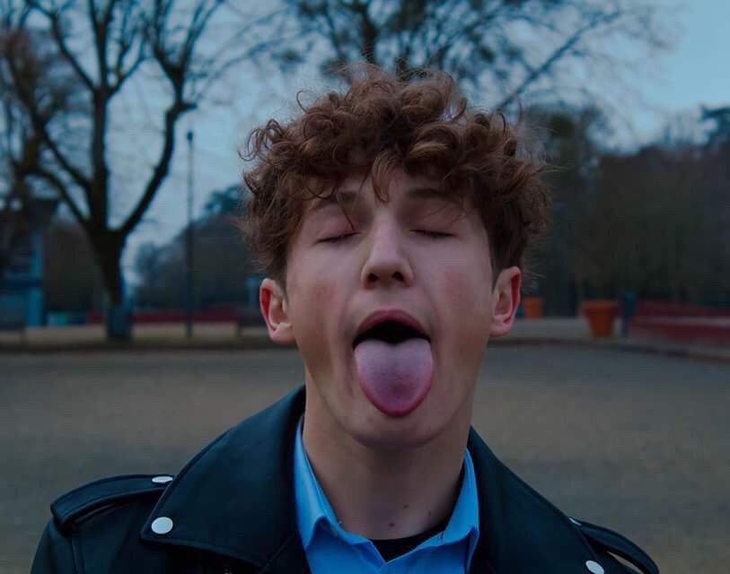 CLOSE-UP OF BOY IN PARK