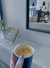 Coffee cup on table