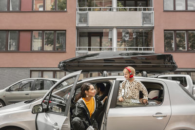 Mother with son in car