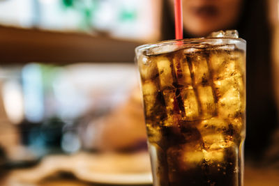Close-up of beer glass on table