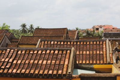 High angle view of roof and building against sky