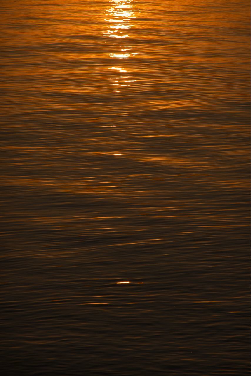 FULL FRAME SHOT OF RIPPLED LAKE