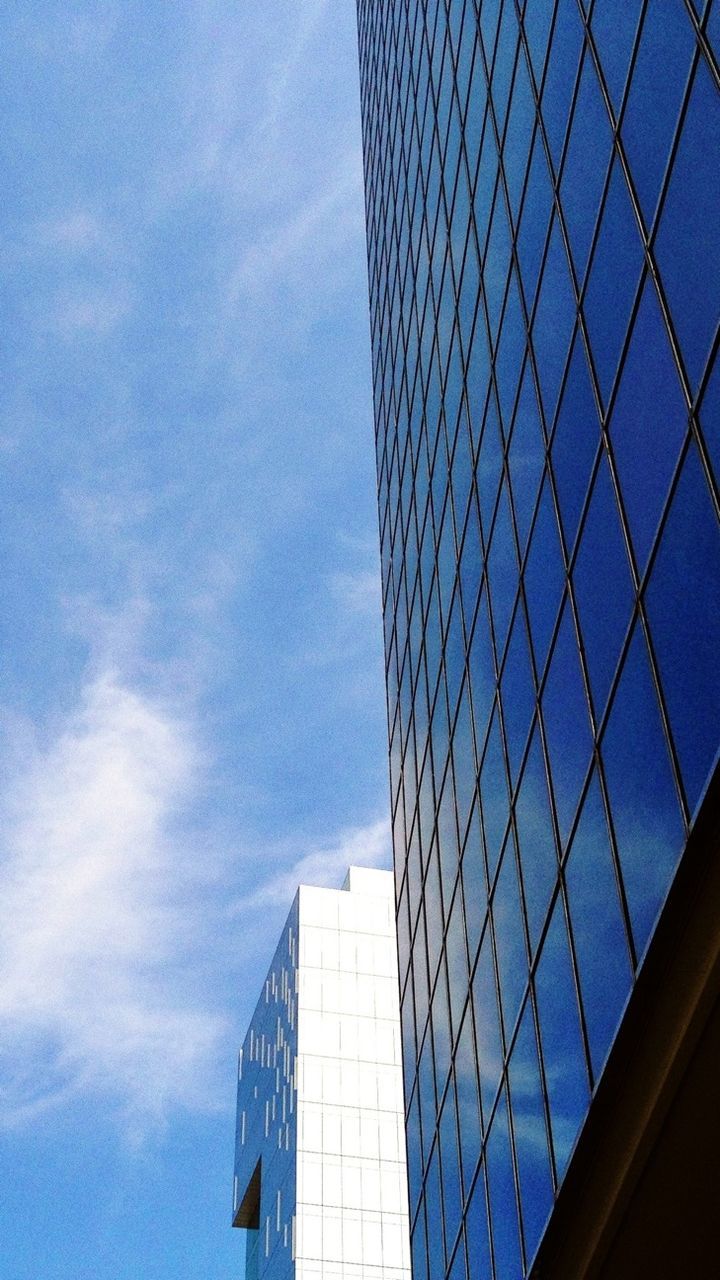 architecture, building exterior, built structure, low angle view, modern, office building, skyscraper, city, tall - high, tower, blue, sky, reflection, glass - material, building, cloud - sky, day, cloud, glass, outdoors