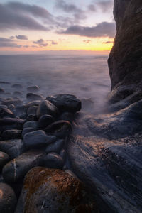 Scenic view of sea against sky during sunset