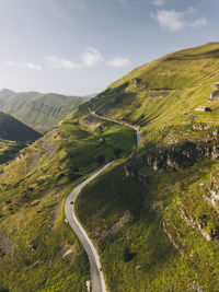 Winding road up to the mountains in valles pasiegos cantabria, spain
