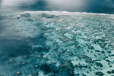 High angle view of surf on beach