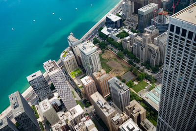 High angle view of cityscape by sea