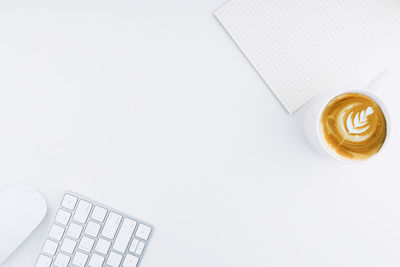 Directly above shot of coffee cup on table