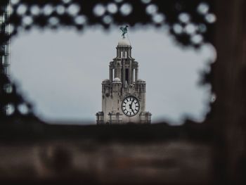 Clock tower against sky