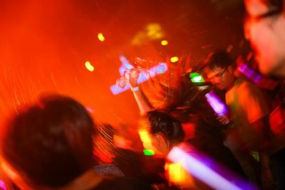 Blurred motion of people at night