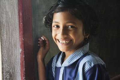 Portrait of smiling girl in school