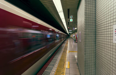 Blurred motion of train at subway station