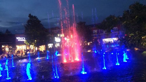 Panoramic view of illuminated city at night