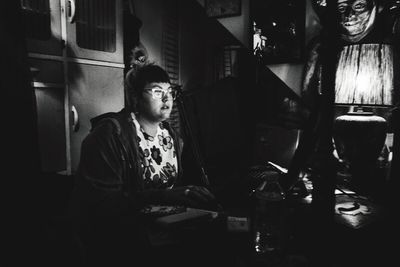 Woman sitting in restaurant