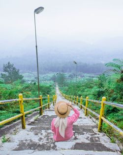 Traveling woman enjoying the nature of the volcano