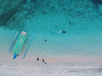 High angle view of people on shore at beach