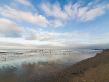 Scenic view of beach against sky