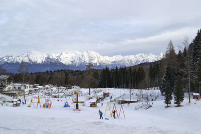 Scenic view of snowcapped mountains against sky