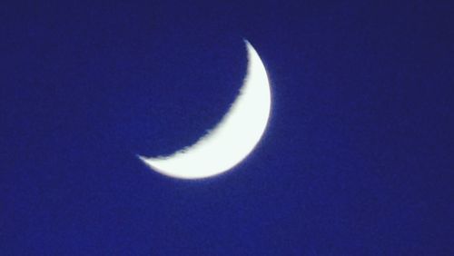 Low angle view of moon in sky