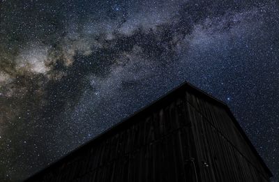 Low angle view of building against sky at night