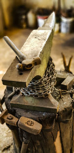 Close-up of rusty metal on table