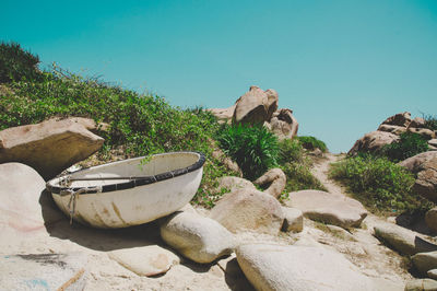 Scenic view of rocks against clear sky