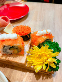 Close-up of sushi served on table