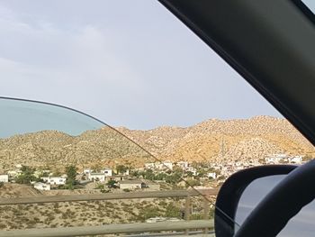 Road seen through car window