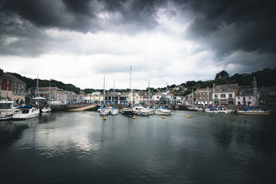 Boats moored in harbor