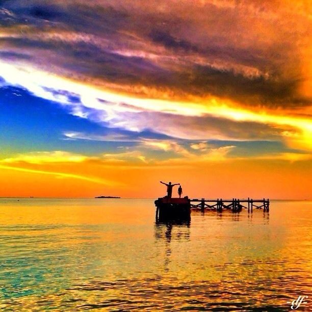 sunset, water, nautical vessel, transportation, boat, mode of transport, sky, waterfront, orange color, scenics, tranquil scene, tranquility, sea, beauty in nature, cloud - sky, silhouette, nature, idyllic, dramatic sky, cloud