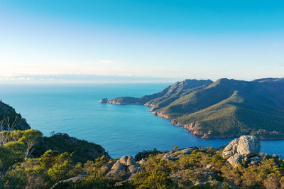 Picturesque seascape view of blue ocean lagoon and mountains. freycinet national park