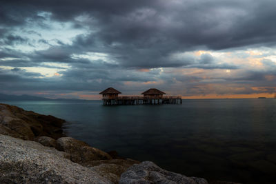 Scenic view of sea against sky during sunrise