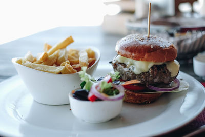 Close-up of burger in plate on table