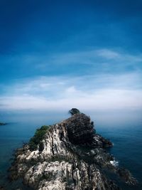 Scenic view of sea against blue sky