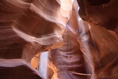 Sunlight streaming through rock formations