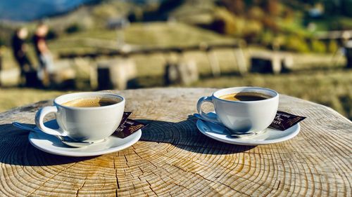 Coffee and cup on table