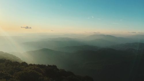 Scenic view of mountains against sky during sunset