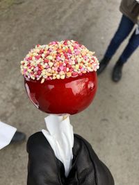 Midsection of person holding ice cream