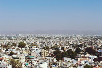 High angle view of cityscape against clear sky