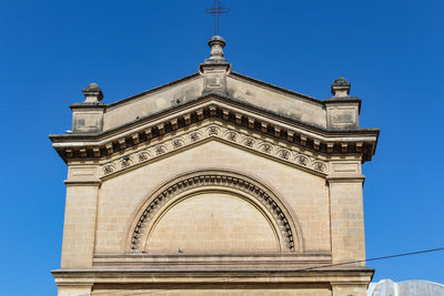 Low angle view of historical building against sky