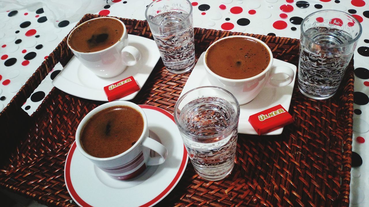 food and drink, drink, refreshment, indoors, freshness, coffee cup, coffee - drink, table, still life, saucer, high angle view, cup, coffee, food, close-up, spoon, frothy drink, breakfast, healthy eating, tea cup