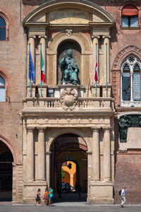 Statue in front of historic building