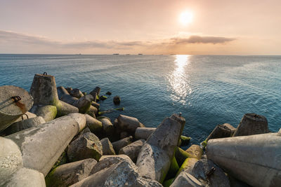 Scenic view of sea against sky during sunset